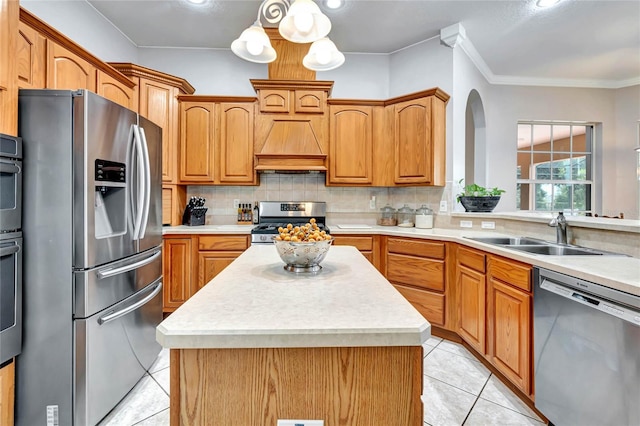 kitchen featuring backsplash, sink, custom exhaust hood, and stainless steel appliances