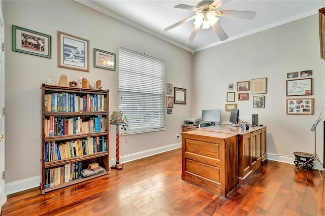 office space featuring ornamental molding, wood-type flooring, ceiling fan, and a textured ceiling