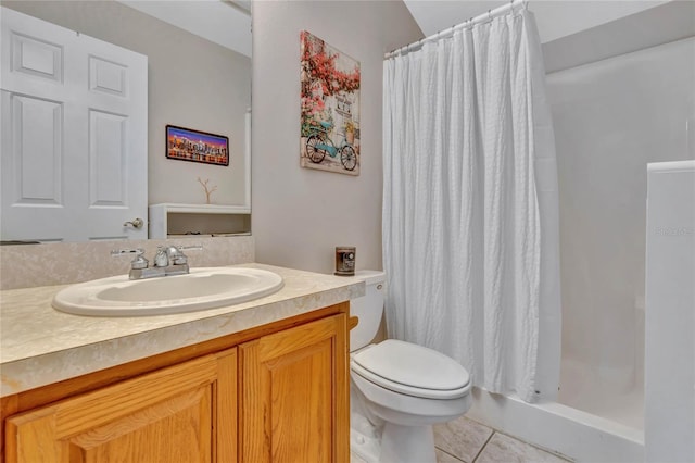 bathroom featuring a shower with curtain, vanity, tile patterned flooring, and toilet