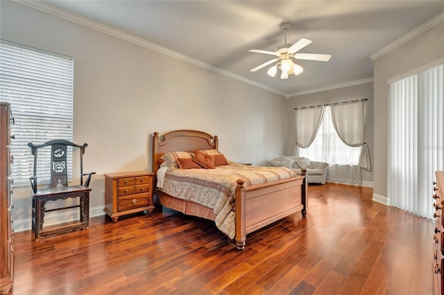 bedroom featuring ornamental molding, wood-type flooring, and ceiling fan