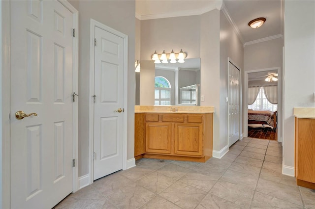 bathroom featuring vanity, ceiling fan, and plenty of natural light