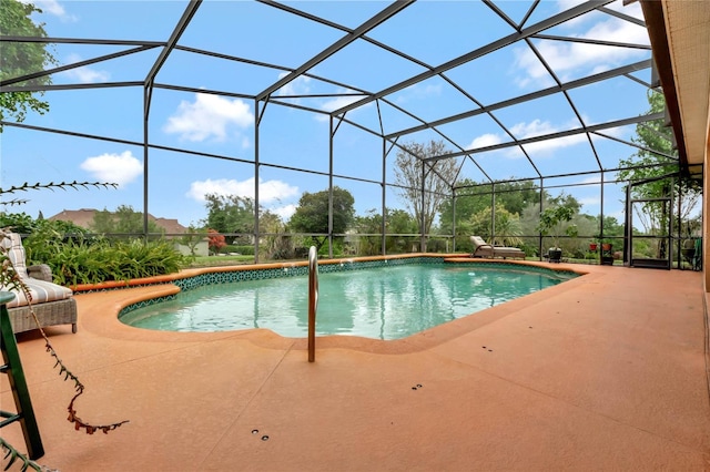 view of pool featuring a lanai and a patio area