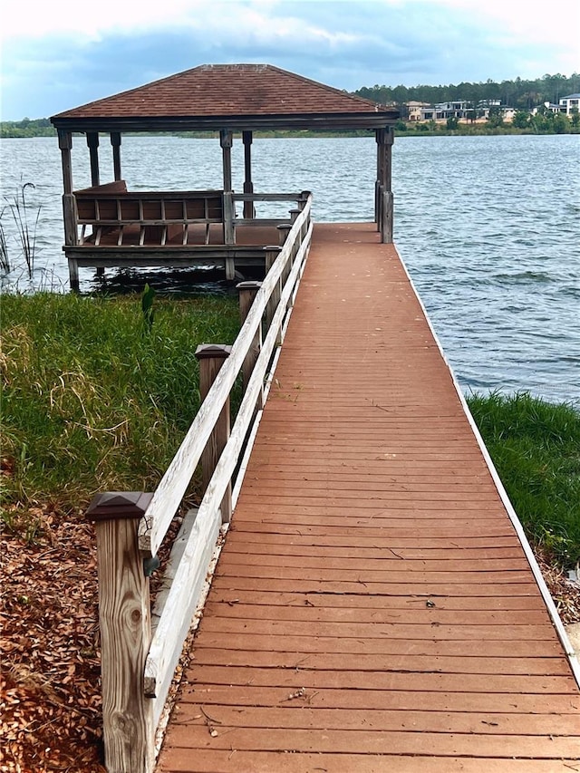 view of dock with a water view