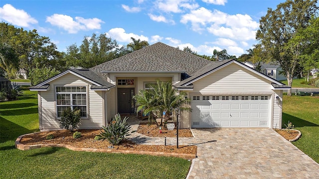 ranch-style house with a front lawn and a garage