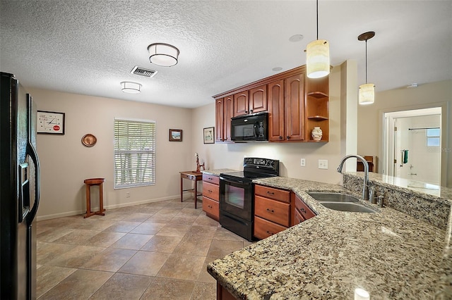 kitchen with a textured ceiling, open shelves, a sink, black appliances, and pendant lighting