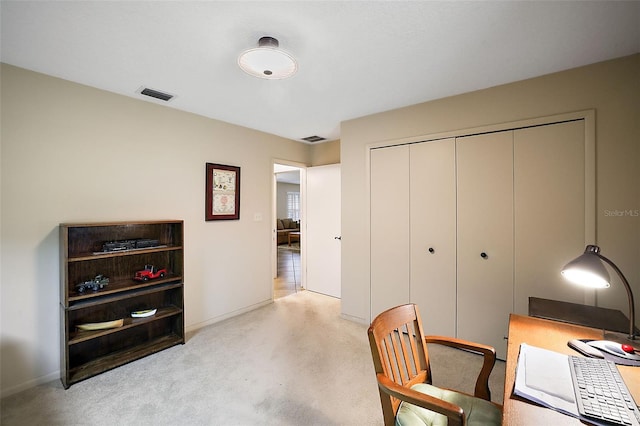 office featuring visible vents and baseboards