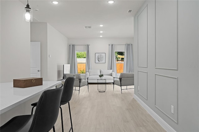 dining room with light wood-type flooring