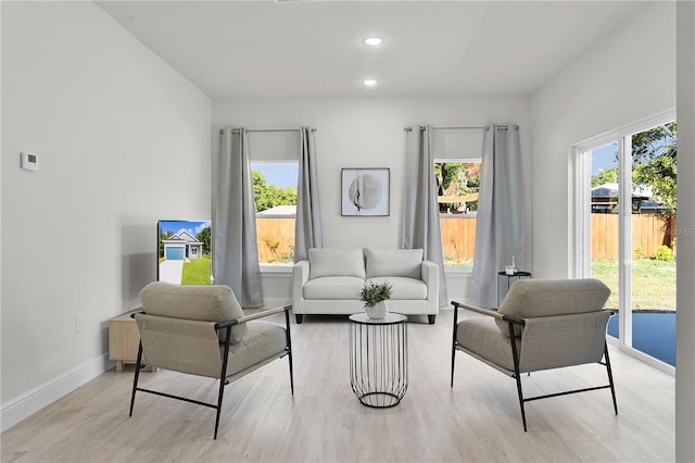 sitting room featuring light hardwood / wood-style floors