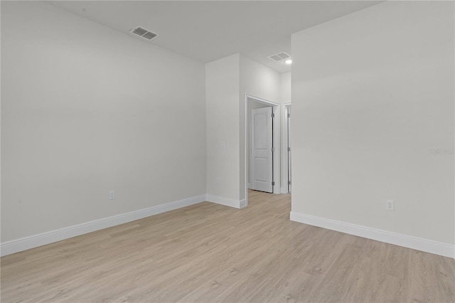 empty room with light wood-type flooring