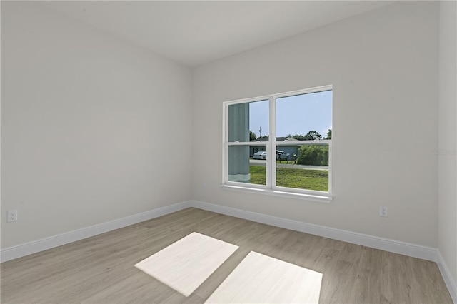 unfurnished room featuring light hardwood / wood-style flooring