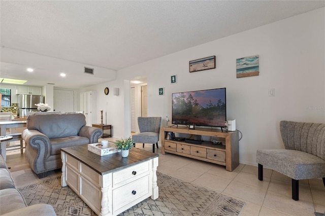 living room with light tile floors