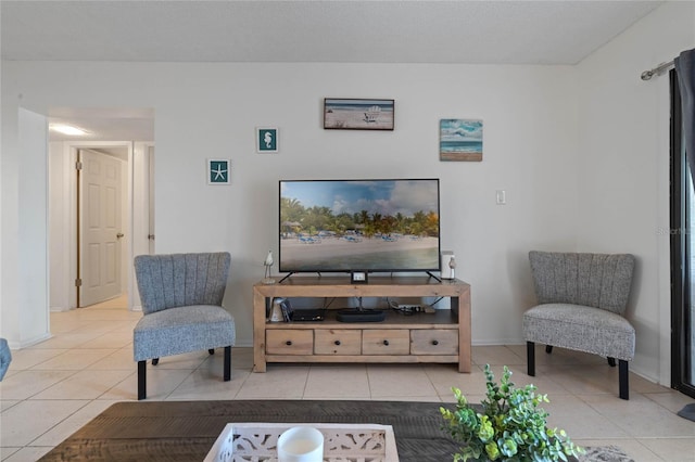 living room featuring light tile floors