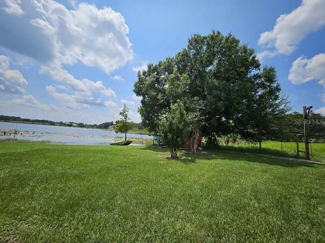 view of yard with a water view