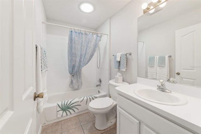 full bathroom featuring shower / bathtub combination with curtain, tile patterned floors, a textured ceiling, toilet, and vanity