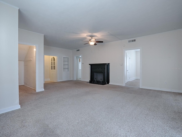 unfurnished living room with light colored carpet and ceiling fan