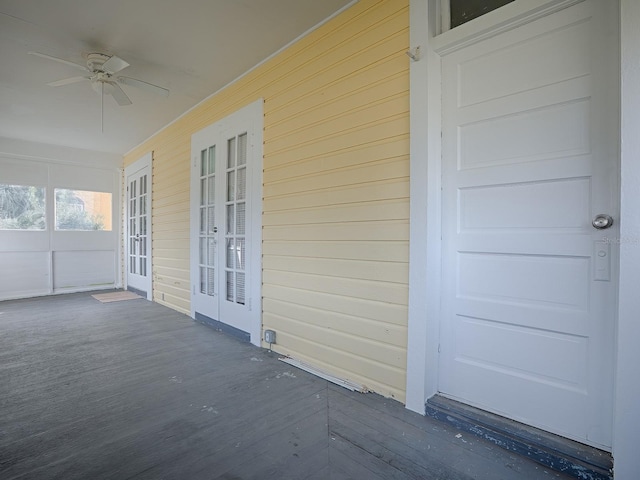 exterior space featuring ceiling fan