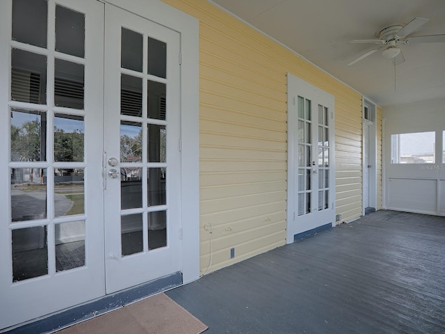 view of terrace with french doors and ceiling fan