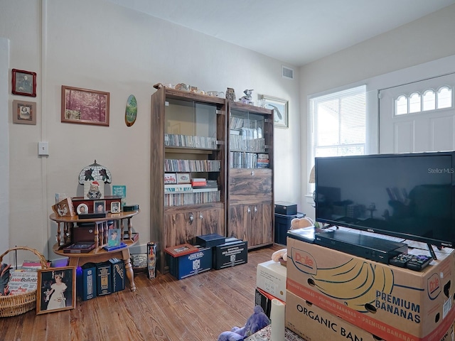 interior space with hardwood / wood-style floors