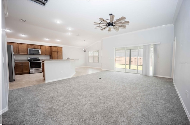 unfurnished living room featuring light carpet, ornamental molding, and ceiling fan