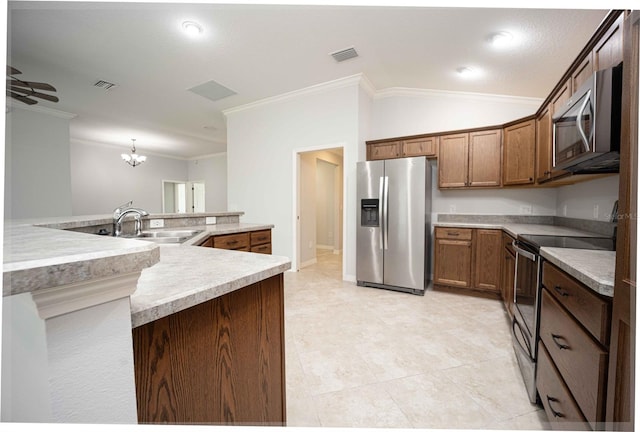 kitchen featuring sink, ornamental molding, appliances with stainless steel finishes, light tile flooring, and ceiling fan with notable chandelier