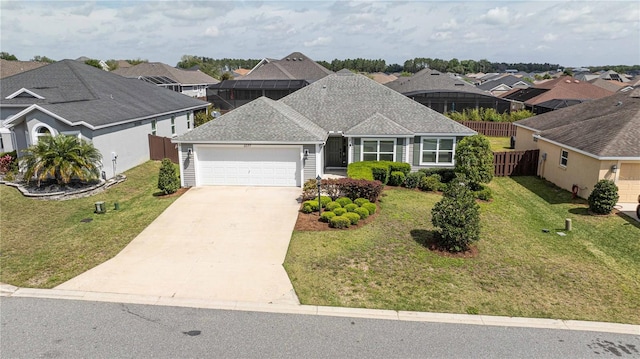 ranch-style home with a front lawn and a garage