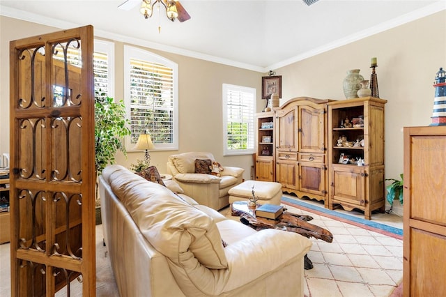 living room featuring ceiling fan and ornamental molding