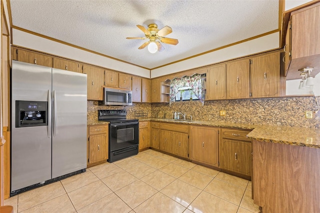 kitchen with stainless steel appliances, light stone counters, tasteful backsplash, ceiling fan, and a textured ceiling