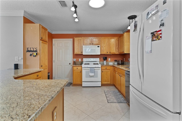 kitchen featuring light stone counters, light tile floors, rail lighting, a textured ceiling, and white appliances