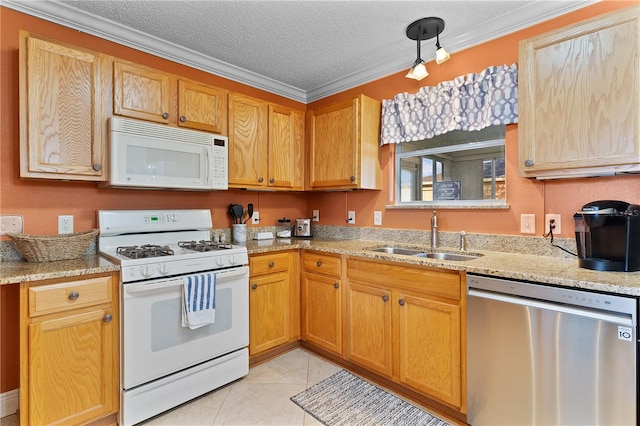 kitchen featuring light tile floors, a textured ceiling, ornamental molding, white appliances, and sink