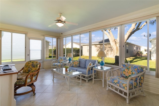 sunroom / solarium with ceiling fan