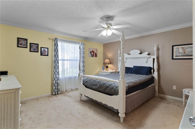 carpeted bedroom with ornamental molding, ceiling fan, and a textured ceiling