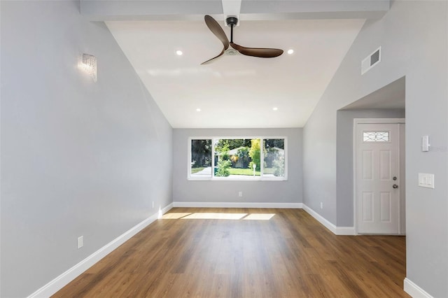 foyer featuring ceiling fan, lofted ceiling with beams, and hardwood / wood-style floors