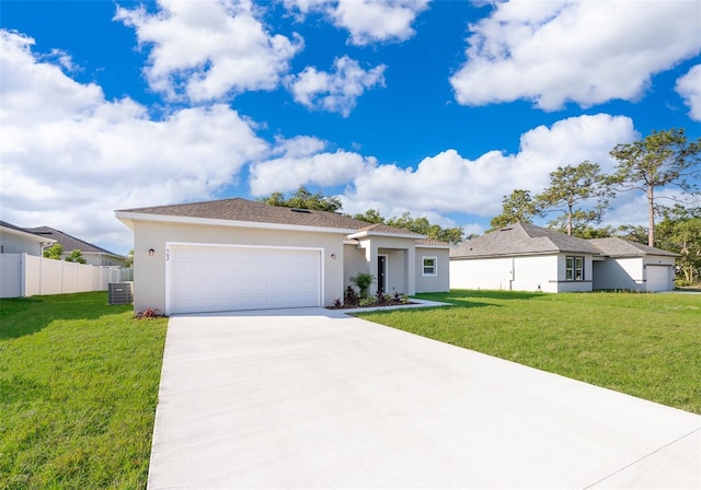 single story home featuring a front lawn, a garage, and central AC unit