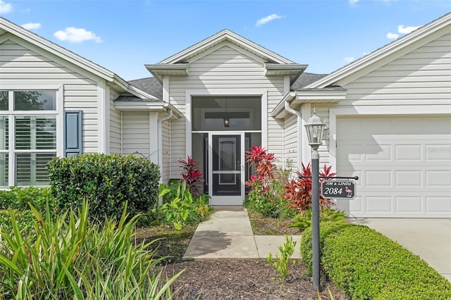 entrance to property with a garage