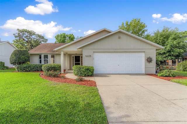 ranch-style house featuring a garage and a front yard