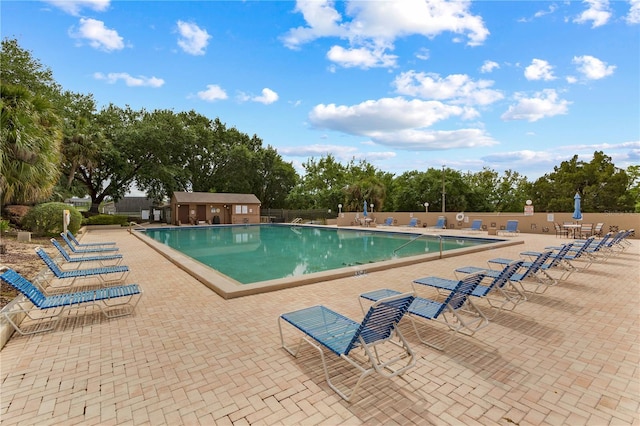 view of pool featuring a patio