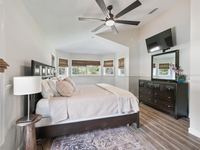 bedroom featuring ceiling fan and light wood-type flooring