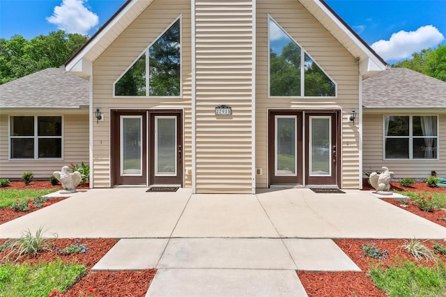 exterior space with french doors and a patio area