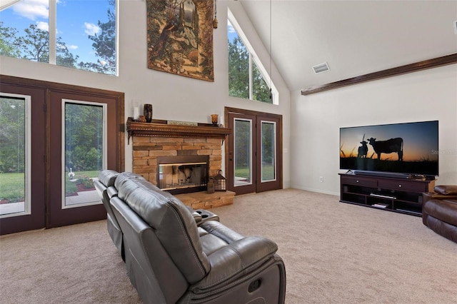 living room with french doors, carpet, high vaulted ceiling, and a fireplace