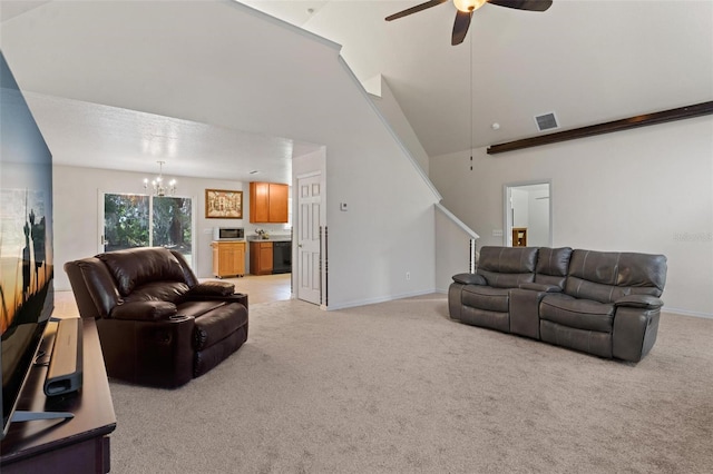 living room with light colored carpet and ceiling fan with notable chandelier