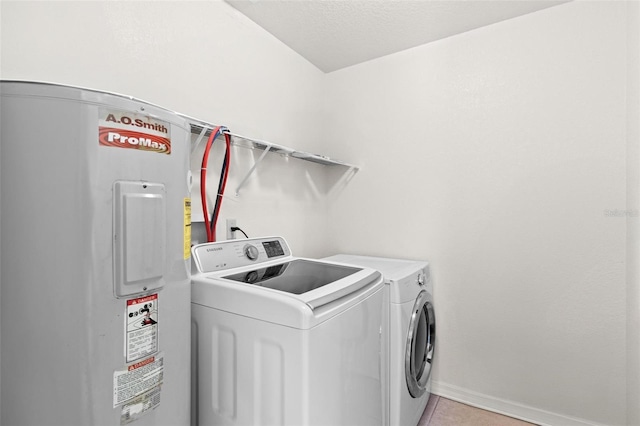 washroom with independent washer and dryer and electric water heater