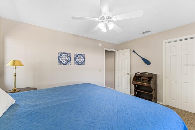 carpeted bedroom with ceiling fan