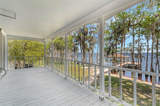 wooden deck with a water view