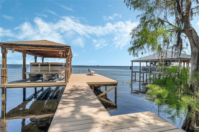 view of dock featuring a water view