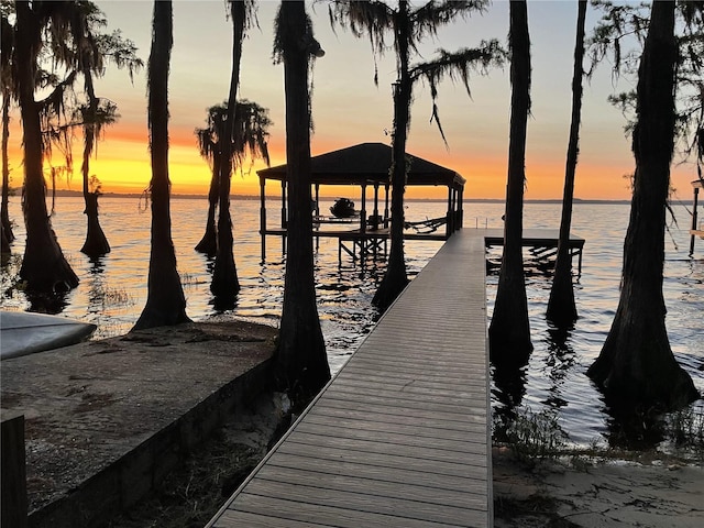 view of dock with a water view