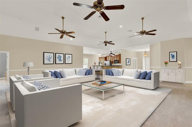 23321 N Buckhill Rd, Howey In The Hills, FL 34737 - living room with light carpet, high vaulted ceiling, recessed lighting, and ceiling fan
