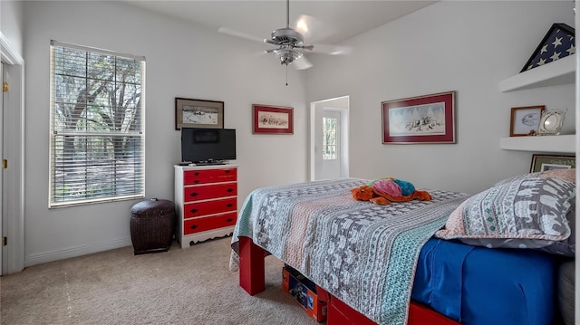 23321 N Buckhill Rd, Howey In The Hills, FL 34737 - bedroom featuring multiple windows, carpet floors, vaulted ceiling, and ceiling fan