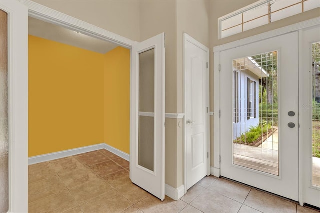 23321 N Buckhill Rd, Howey In The Hills, FL 34737 - foyer entrance featuring light tile patterned flooring and healthy amount of natural light