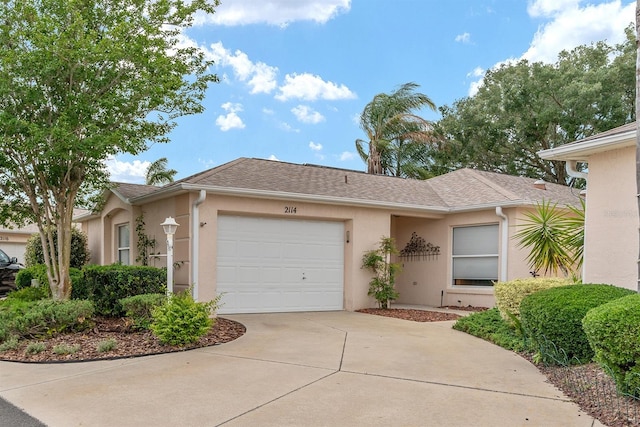 single story home with a garage