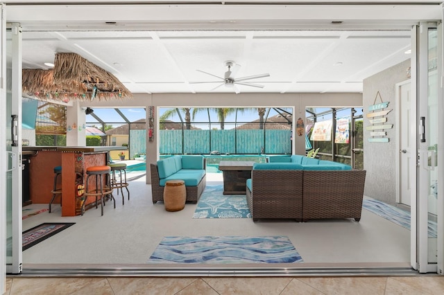 interior space with ceiling fan and a wealth of natural light